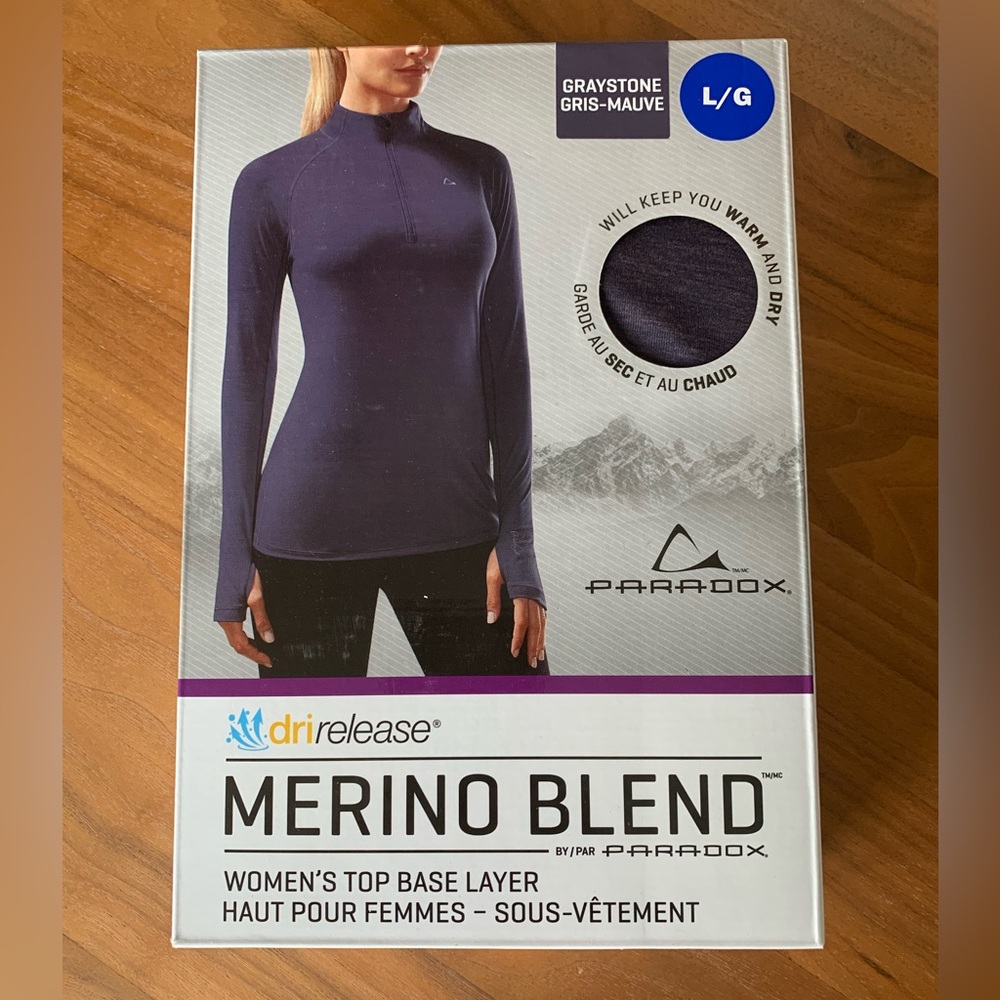 Woman’s Paradox Merino Blend Base Layer Half-Zip. Size M. Sealed box.